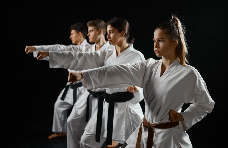 Martial arts classes offer a full body workout that helps with weight management, blood pressure control, and overall fitness, making taekwondo an ideal physical activity for burning calories and staying active.
