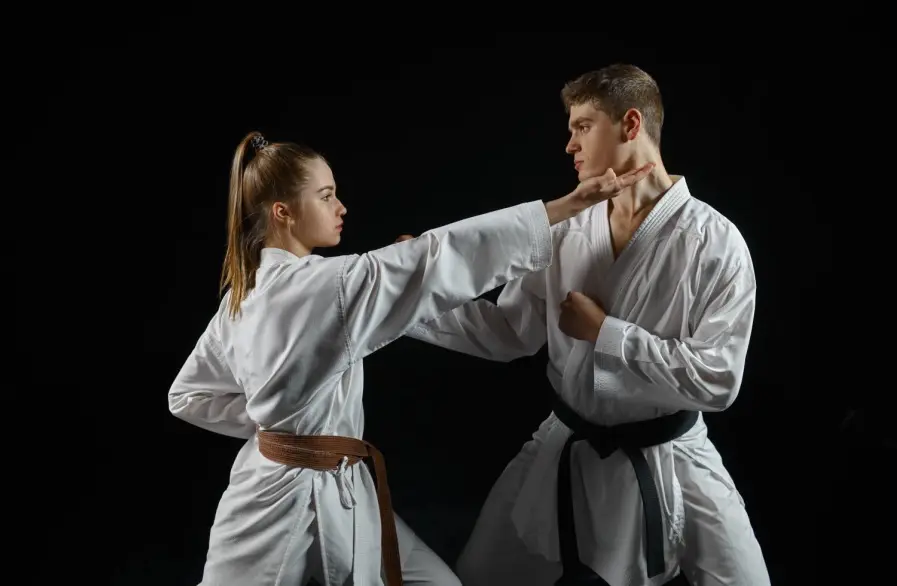 Through the sport of taekwondo, students experience both the physical benefits of building strength and the mental benefits of self-discipline, as they engage in martial arts self-defense training designed to enhance their overall well-being.