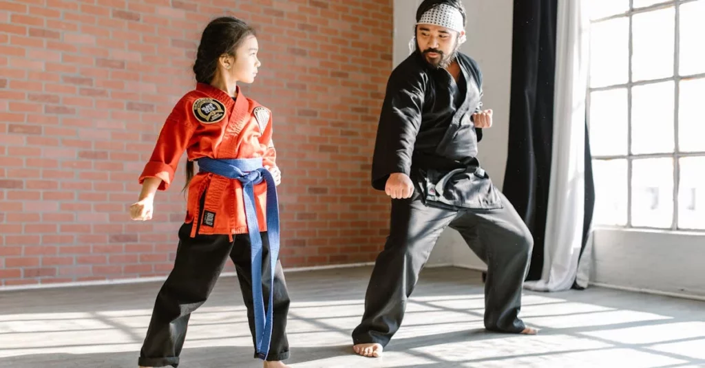 Instructor guiding student through stance work for taekwondo forms